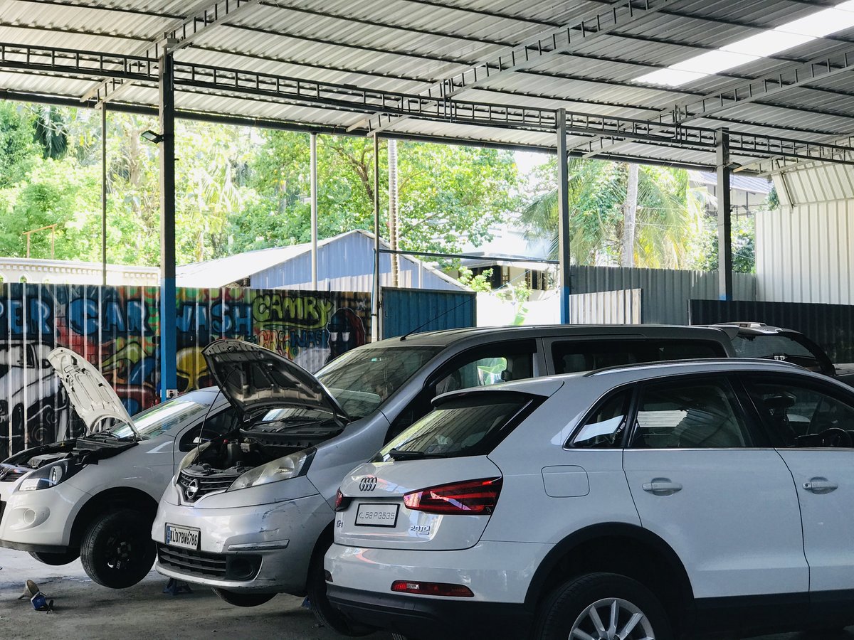 Camry Motors workshop exterior with cars